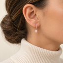 Boucles d'oreilles Créoles Hamsa or rose portées