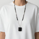 שרשרת פתק שחור – חרוזים שחורים וקמע עור