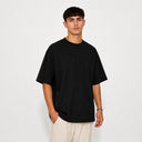 T-shirt Tsitsit noir oversize pour homme Eliorness avec coupe streetwear et fermeture éclair sur le côté droit.